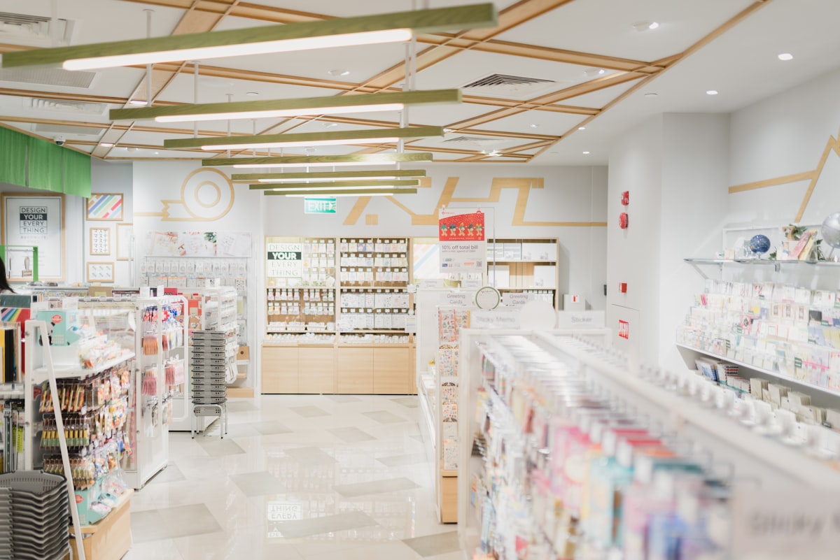 A pharmacy counter with several prescription bottles lined up for review